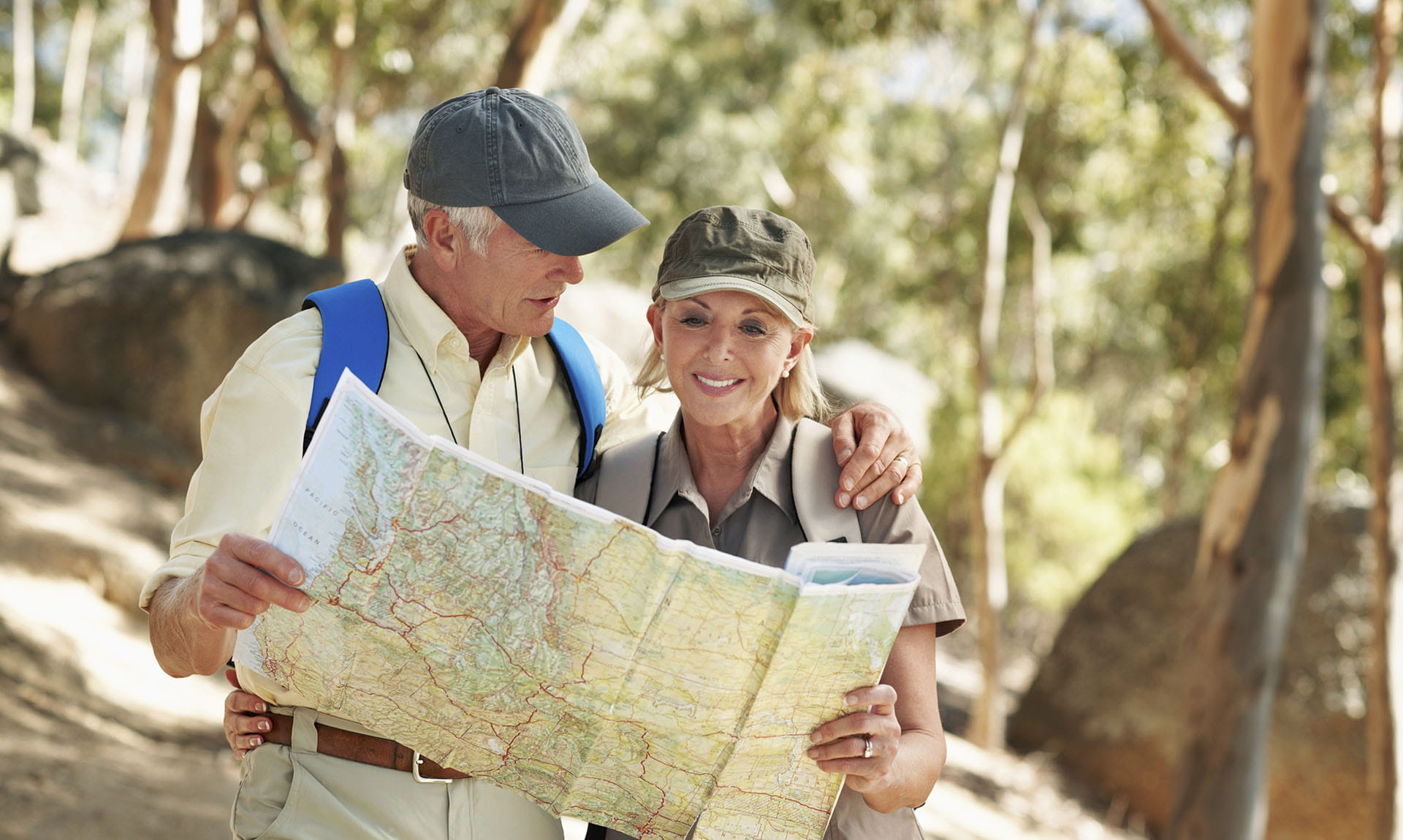 A tourist couple reading a map